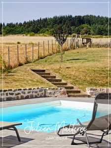Recent house of 170 m² on 2100 m² of preserved land, 7 rooms, 5 bedrooms including dressing room, 85 m² garage in MAROLS (42)