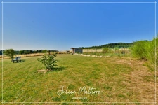 Recent house of 170 m² on 2100 m² of preserved land, 7 rooms, 5 bedrooms including dressing room, 85 m² garage in MAROLS (42)