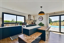 Recent house of 170 m² on 2100 m² of preserved land, 7 rooms, 5 bedrooms including dressing room, 85 m² garage in MAROLS (42)