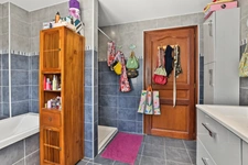 Grande maison familiale de 330 m² Carrez sur 1400 m² de terrain - 4 chambres, sous-sol complet et combles aménagés