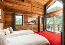 ULTRA-PREMIUM ALPINE COMPLEX of 3,500 m² in TIGNES (73) 5 Chalets, ski-in/ski-out access, view, swimming pool. 