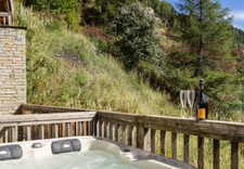 ULTRA-PREMIUM ALPINE COMPLEX of 3,500 m² in TIGNES (73) 5 Chalets, ski-in/ski-out access, view, swimming pool. 