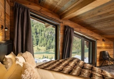 ULTRA-PREMIUM ALPINE COMPLEX of 3,500 m² in TIGNES (73) 5 Chalets, ski-in/ski-out access, view, swimming pool. 