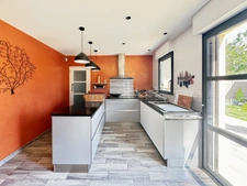 Sur la commune de Trélazé : Magnifique maison contemporaine d'architecte de haut standing avec vie de plain-pied, jardin, chalet, garage