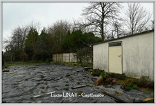 Maison de bourg à rénover + terrain et garage non attenants