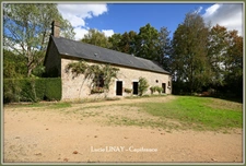 Domaine paysager reconnu avec parc floral, batiments et terres agricoles