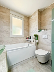 Appartement à vendre 3 pièces DIVONNE LES BAINS (01) - 91m2 - terrasses, jardin, cave et garage