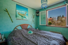 Maison de 78 m2 sur un sous-sol total implantée sur un terrain de 1200m2 à AVEIZE (69)