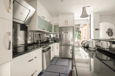 Appartement de 80m2, 2 chambres, 2 places de parking à FONTAINES SUR SAONE (69)