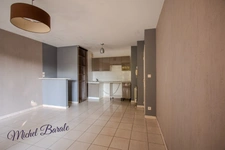 Appartement Tassin-la-Demi-Lune – 38 m² avec terrasse, idéalement situé,  garage possible.