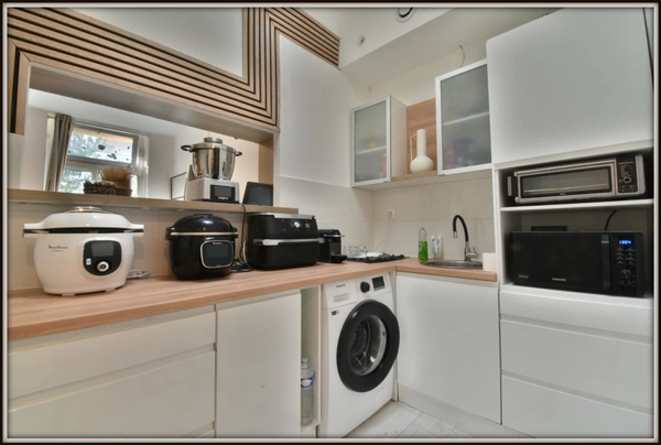  Appartement rénové avec jardin privatif – Vendu entièrement meublé 1 pièces NIMES (30)