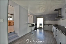 Immeuble avec local commercial et grand appartement sur LEZIGNAN LA CEBE