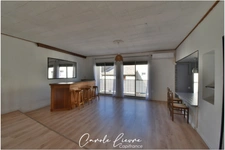 Immeuble avec local commercial et grand appartement sur LEZIGNAN LA CEBE