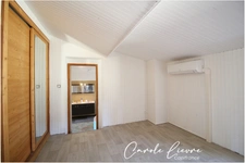 Immeuble avec local commercial et grand appartement sur LEZIGNAN LA CEBE