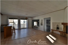 Immeuble avec local commercial et grand appartement sur LEZIGNAN LA CEBE
