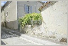  For sale LAMONTJOIE P4 stone village house to renovate, with converted outbuilding