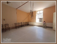 Maison de ville en pierre de 130m2 avec cour et préau- A rénover