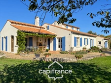 Maison 165 m² avec beaux volumes et jardin paysager – Fontaines
