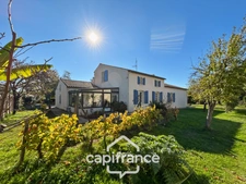 Maison 165 m² avec beaux volumes et jardin paysager – Fontaines