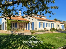 Maison 165 m² avec beaux volumes et jardin paysager – Fontaines