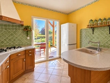 MONTRÉJEAU (31) – À VENDRE – Maison de plain-pied de 124 m² – 3 chambres et bureau – Véranda, garage et terrain de 2 576 m².