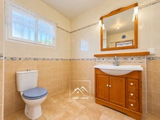 MONTRÉJEAU (31) – À VENDRE – Maison de plain-pied de 124 m² – 3 chambres et bureau – Véranda, garage et terrain de 2 576 m².