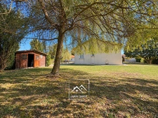 MONTRÉJEAU (31) – À VENDRE – Maison de plain-pied de 124 m² – 3 chambres et bureau – Véranda, garage et terrain de 2 576 m².