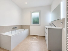 IDRON (64) – À VENDRE – Maison neuve de plain-pied de 145 m² – 4 chambres, suite parentale, terrasse et garage.