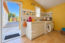 MONTRÉJEAU (31) – À VENDRE – Maison de plain-pied de 124 m² – 3 chambres et bureau – Véranda, garage et terrain de 2 576 m².