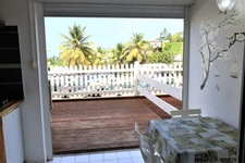 EN EXCLUSIVITÉ – LE MOULE - GRAND STUDIO MEUBLÉ – REZ-DE-CHAUSSÉE – PETITE VUE MER