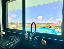 EXCLUSIVE - FOR SALE - EXCEPTIONAL PROPERTY WITH SEA VIEW AND REMARKABLE RENTAL POTENTIAL - SAINTE ANNE