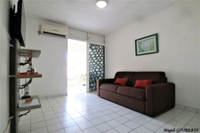 EN EXCLUSIVITÉ – LE MOULE - GRAND STUDIO MEUBLÉ – REZ-DE-CHAUSSÉE – PETITE VUE MER