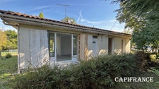 Maison à vendre charmant plain-pied en pierre de taille - 3 chambres - jardin clos et boisé - à FONTCOUVERTE (17100)