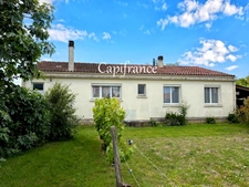 Maison familiale  - 4 chambres, avec garage et appentis et jardin sur un terrain 900 m² 
