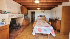 Ensemble immobilier : maison + gîte + annexe + garage, atelier et jardin clos à  NIEUL LES SAINTES (17)