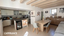 Charentaise stone house - in the heart of the village - 120 m² of living space - 5 bedrooms, 3 of which are in the converted attic
