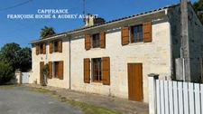 Ensemble immobilier : maison + gîte + annexe + garage, atelier et jardin clos à  NIEUL LES SAINTES (17)