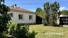 Maison familiale  - 4 chambres, 102 m² habitables avec garage et appentis et jardin sur un terrain 900 m² 