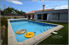 CARCASSONNE proche centre ville. Maison T6 Plain pied 130m² sur terrain de 508 m² avec grand garage et piscine.