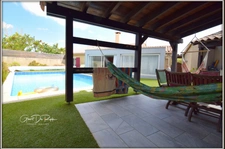 CARCASSONNE proche centre ville. Maison T6 Plain pied 130m² sur terrain de 508 m² avec grand garage et piscine.