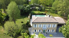 Magnifique demeure en pierre avec grand jardin, piscine & espace professionnel 