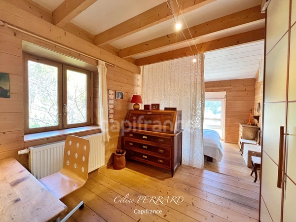 Maison bioclimatique en bois, nature, verger, vue lacs et montagnes, proche frontière. 5 pièces MACHILLY (74)