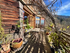 Maison bioclimatique en bois, nature, verger, vue lacs et montagnes, proche frontière. 5 pièces MACHILLY (74)