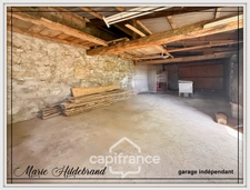 Maison de caractère de 130m² - 3 chambres - garages - jardin