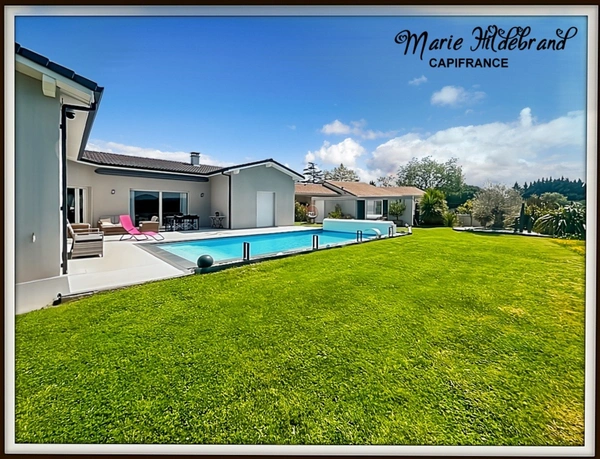 MURET – Villa contemporaine 134 m² – Séjour cathédrale, jardin 1000m², piscine & vue dégagée