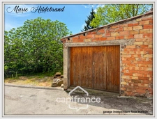 Maison de caractère de 130m² - 3 chambres - garages - jardin