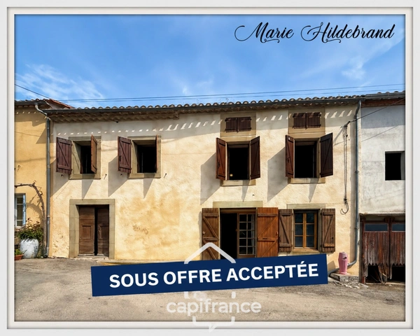 Maison de caractère de 130m² - 3 chambres - garages - jardin