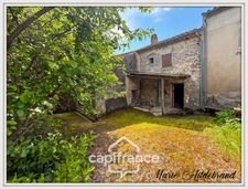 Maison de caractère de 130m² - 3 chambres - garages - jardin