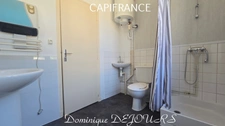 Maison composée de 2 appartements (57 et 43m²) et d'un grand garage de 100m².