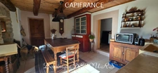 Maison en pierres avec deux logements, terrasse et terrain de 7 800 m² – Saint-Jean-Roure (07160)